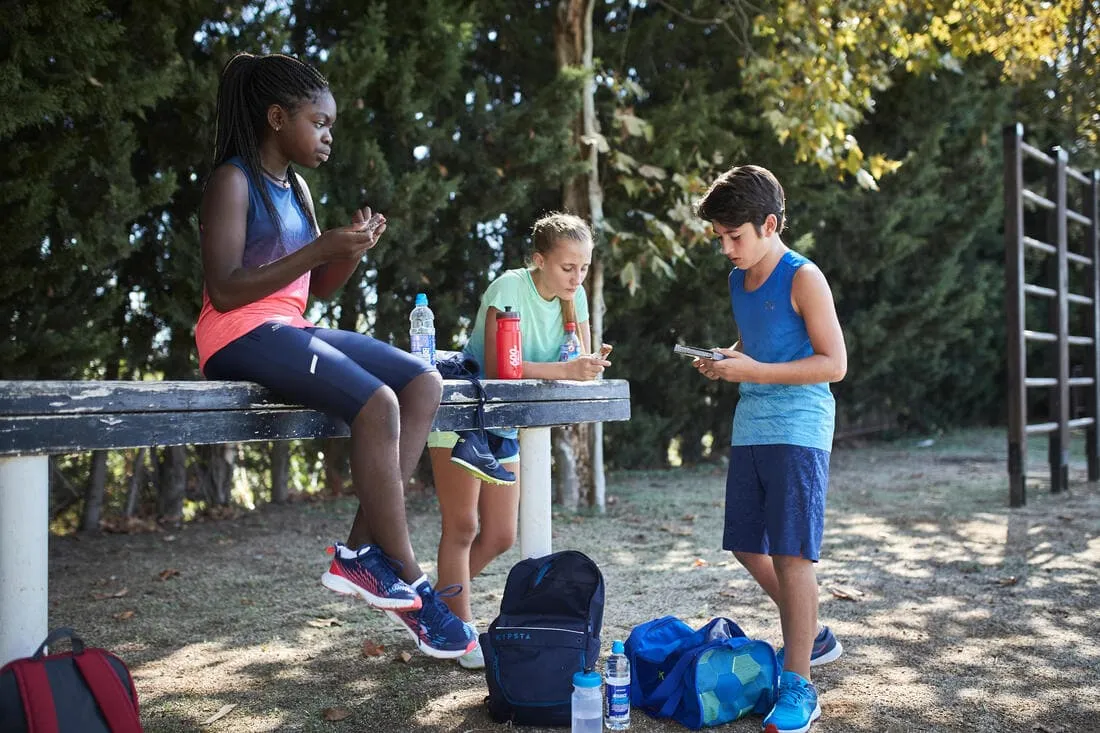 Débardeur running - athlétisme respirant garçon KIPRUN CARE bleu et rouge