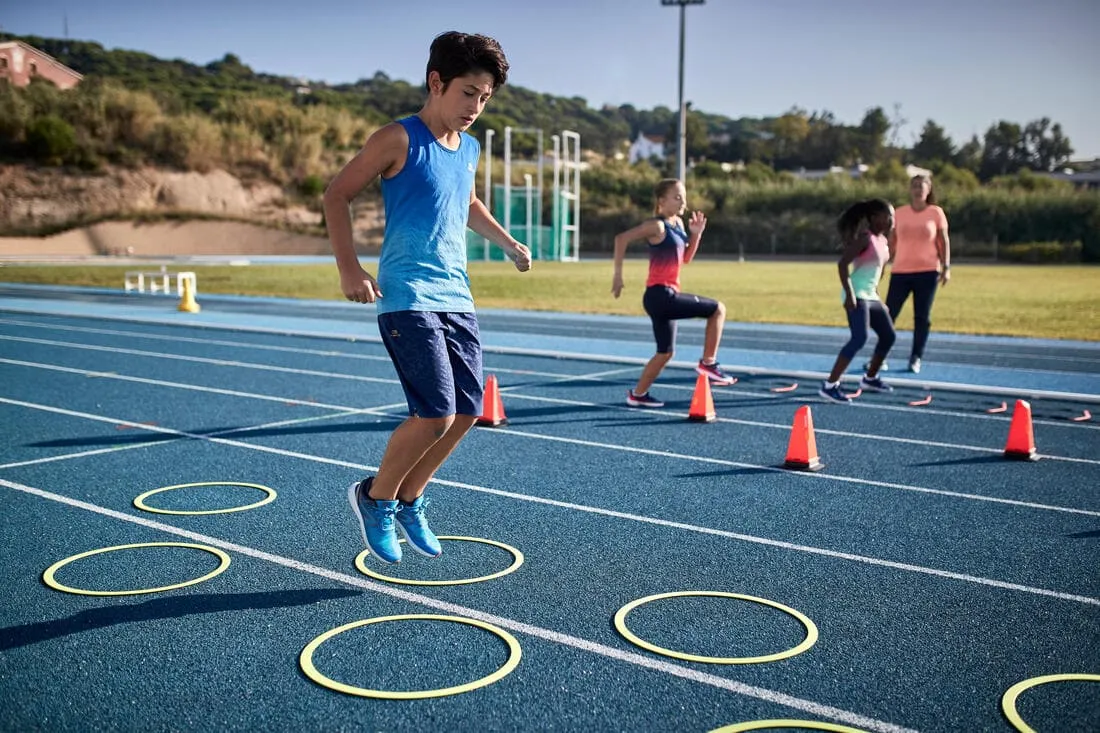 Débardeur running - athlétisme respirant garçon KIPRUN CARE bleu et rouge