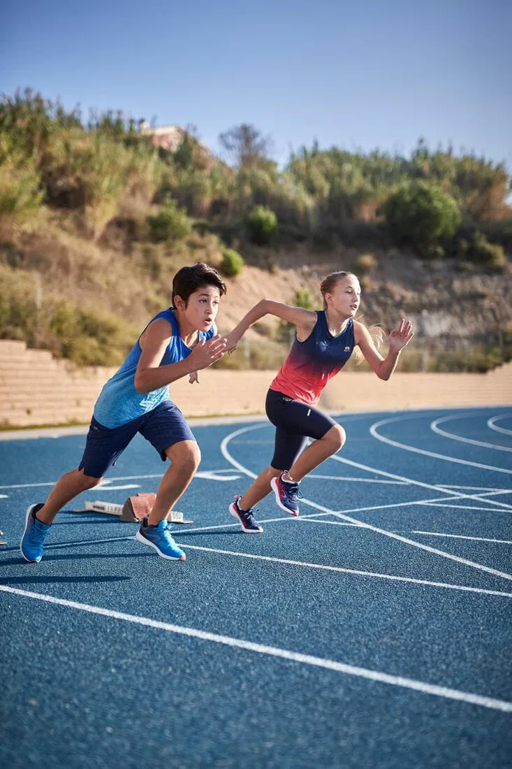 Débardeur running - athlétisme respirant garçon KIPRUN CARE bleu et rouge