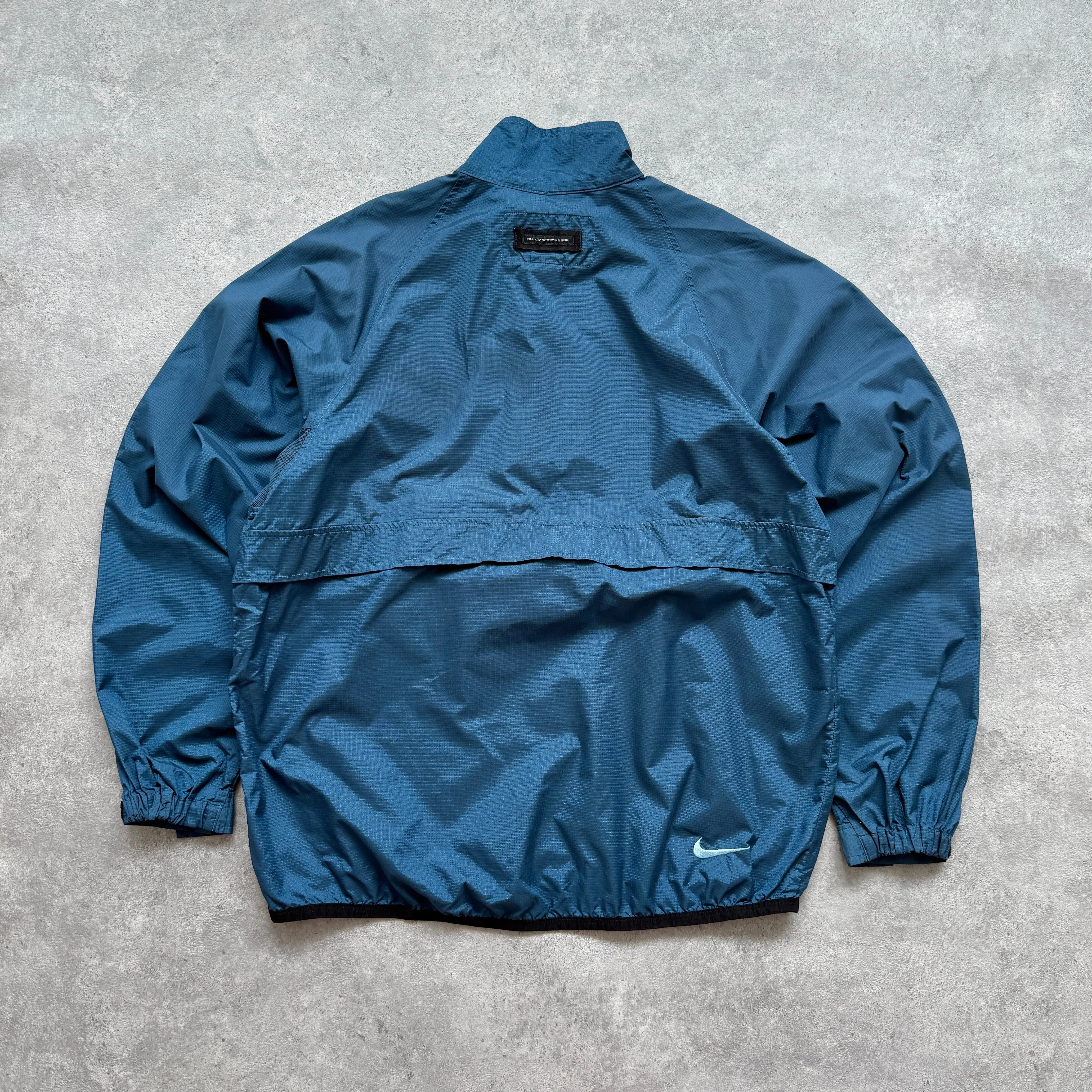 Nike ACG 1990s technical lightweight packable shell jacket (L)